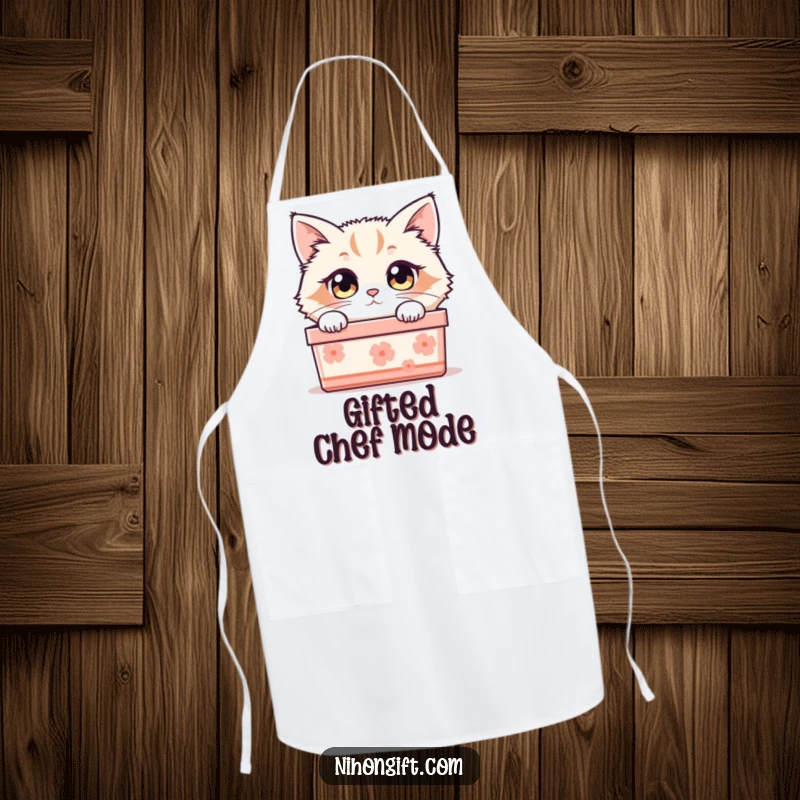 Funny cat apron featuring a fluffy cat peeking out of a Japanese gift box, adding curiosity to kitchen tasks.