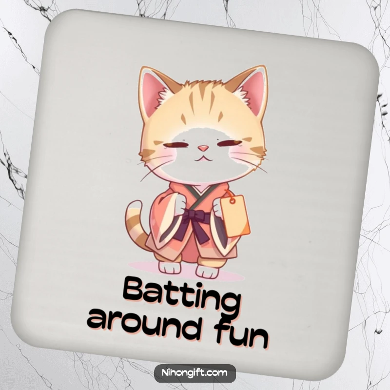Funny cat kimono coaster featuring a curious cat batting at a dangling gift tag, offering whimsical surface protection with a playful touch.