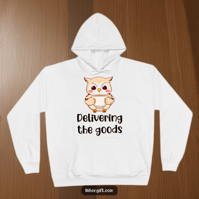 Funny Owl Tea Hoodie: A cheerful little owl gently carries a delicate ceramic tea cup, ready for a cozy delivery.