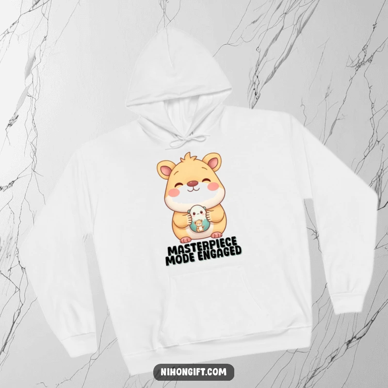 Funny hoodie showing a happy animal beaming while displaying a small, hand-painted ceramic figure, symbolizing artistic pride.