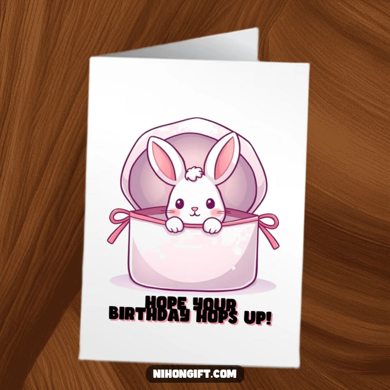Funny Free Printable Birthday Card: A playful rabbit with huge ears peeking out of a giant, shimmering, open gift bag.