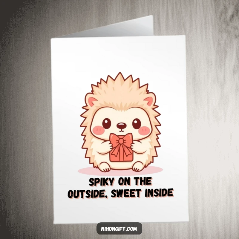Funny free printable birthday card featuring a kawaii hedgehog offering a tiny, decorative gift with a bow, full of birthday wishes.
