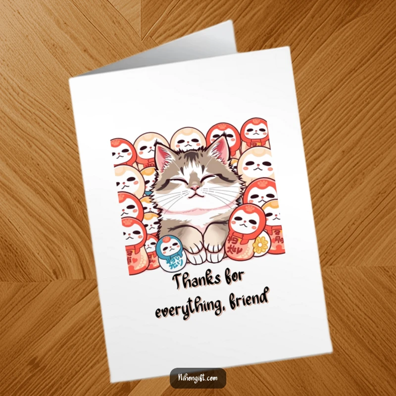 Funny Free Printable Thank You Card: Content fluffy cat purring peacefully nestled among colorful Daruma dolls, a sweet thank you message.