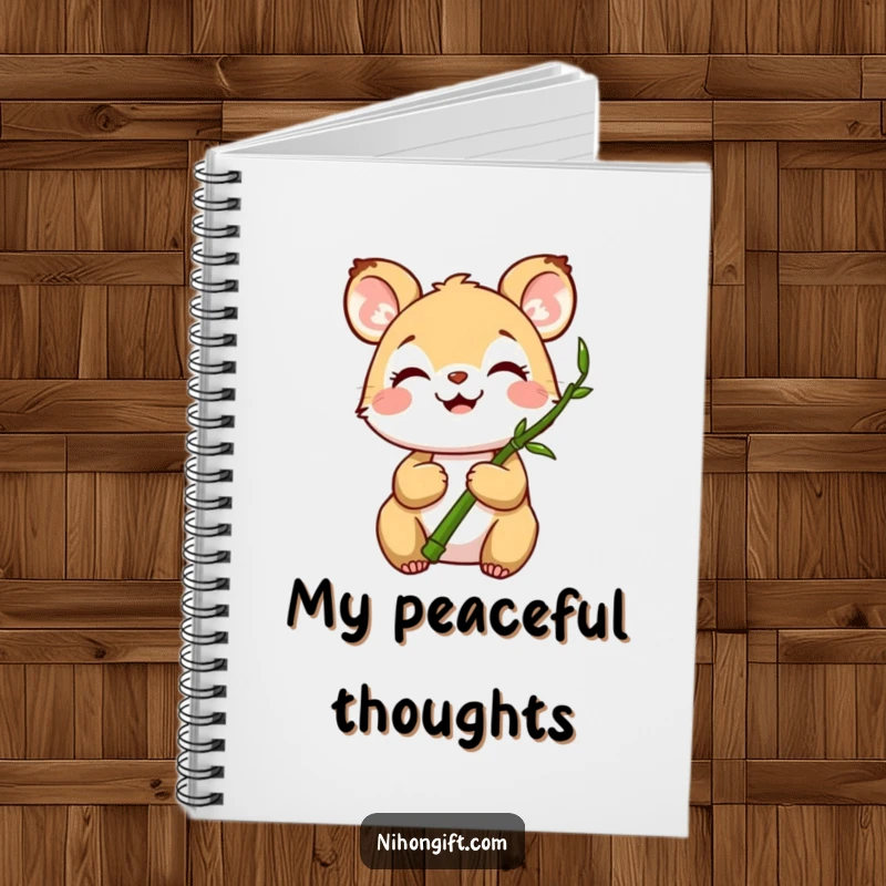 Funny notebook showcasing a joyful animal holding a miniature bamboo stalk, perfect for peaceful journaling.