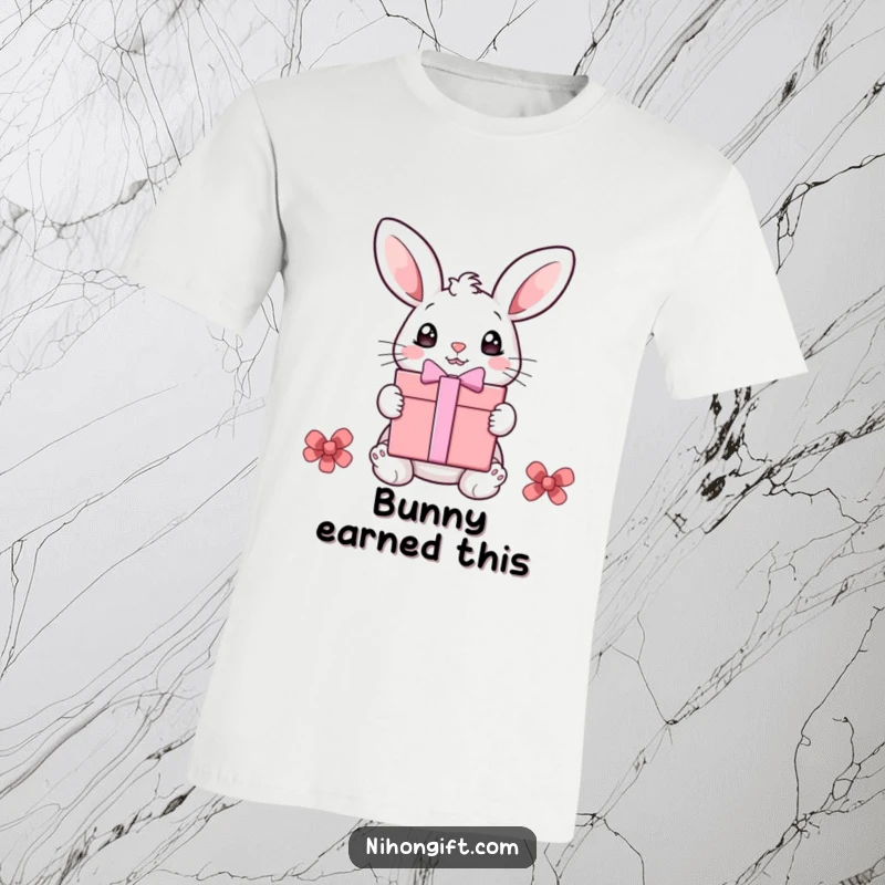 Funny bunny t-shirt featuring a wide-eyed bunny receiving a large gift, conveying excitement and humor, ideal for gifts.
