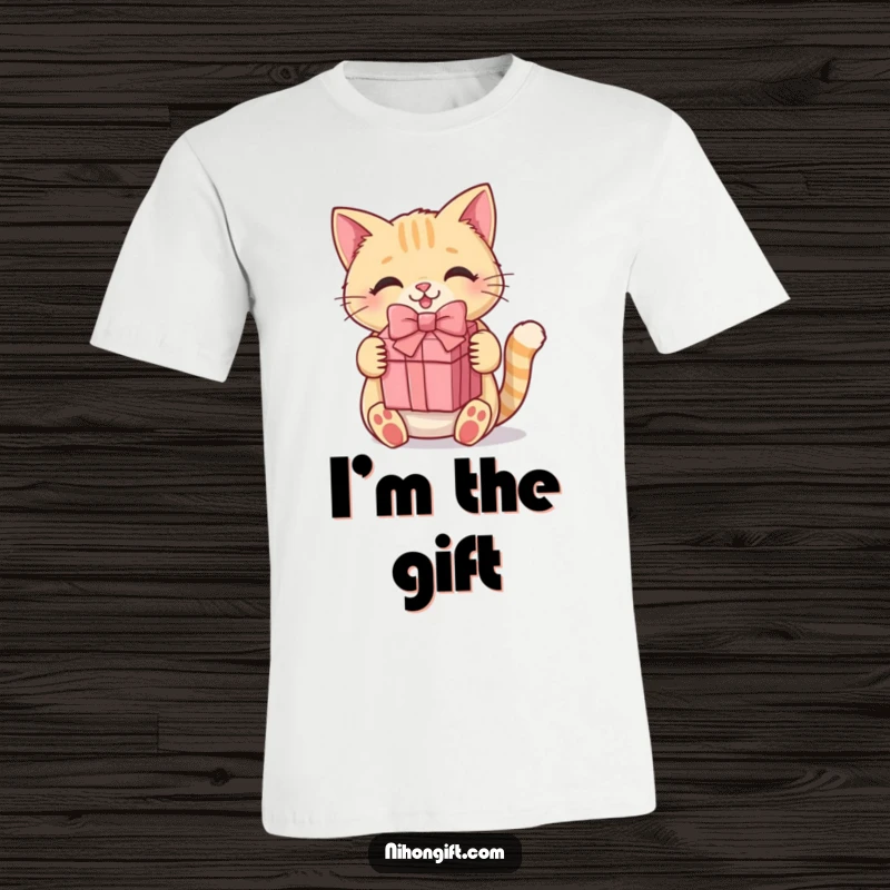 Funny kawaii cat t-shirt showing a happy, cute kitten holding a present with a bow, perfect for gift-giving occasions.