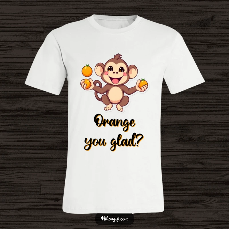 Funny Kawaii Monkey T-Shirt showing a monkey juggling oranges with a mischievous grin.