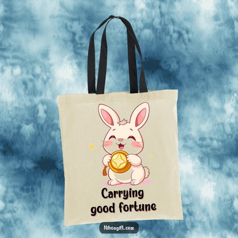Funny tote bag with a happy bunny presenting a shiny trinket, great for shopping and carrying luck.