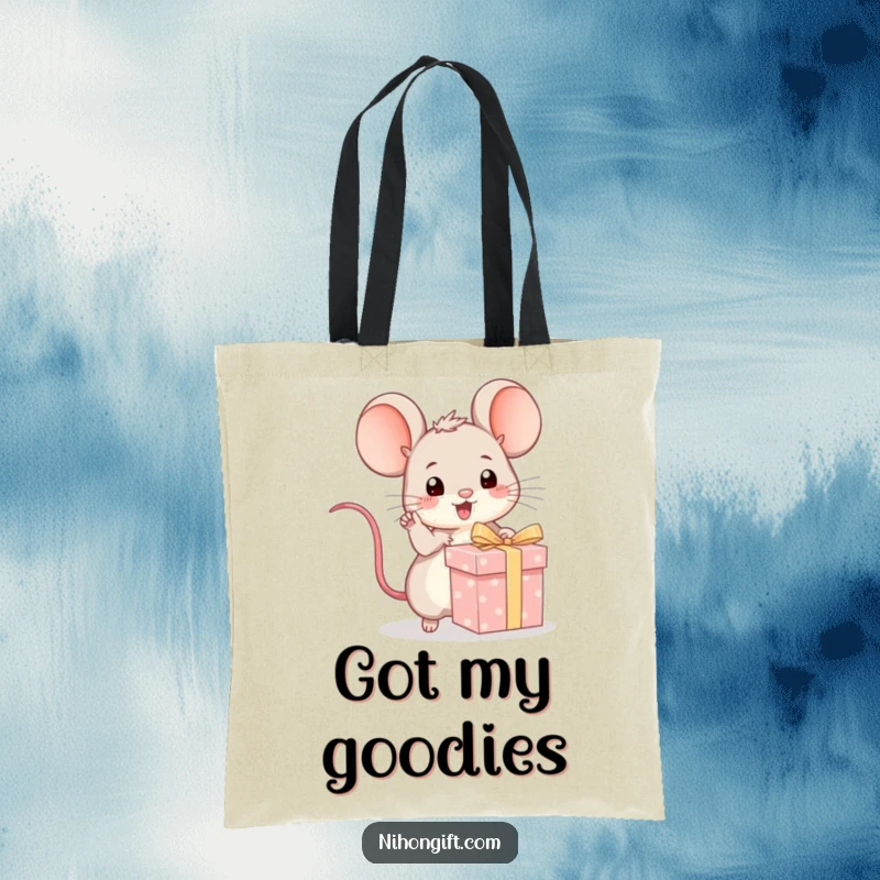 Funny kawaii mouse excitedly pointing at a wrapped gift on a durable tote bag, perfect for carrying treasures.