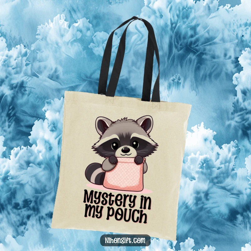 Funny Kawaii Raccoon Tote Bag depicting a cute raccoon peering curiously into a shimmering gift bag, perfect for carrying treasures.