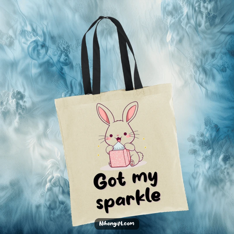 Funny kawaii bunny tote bag, captured mid-unboxing a glittery package with ecstatic expression. Ideal for shoppers who love joy.